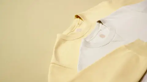 Cozy Tasc Performance Sweatshirts That Are Perfect For Lounging